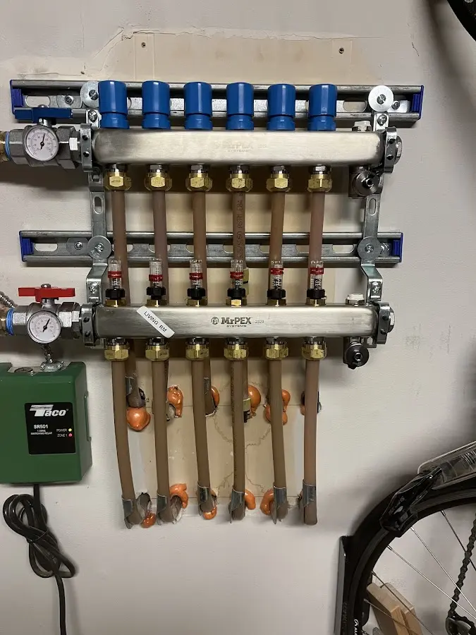 Plumber performing Gas Line Installation at a residential property in Creston